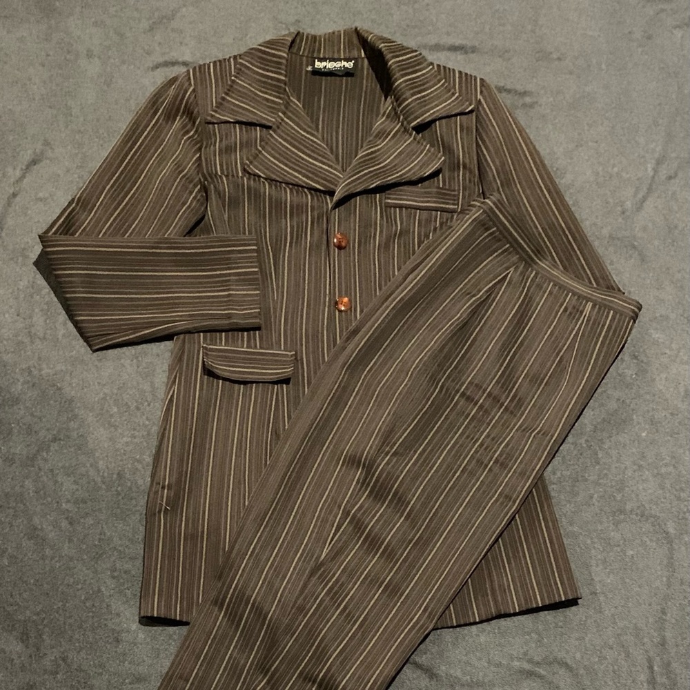 Woman suit size 7/8.  Long jacket and peg leg pants